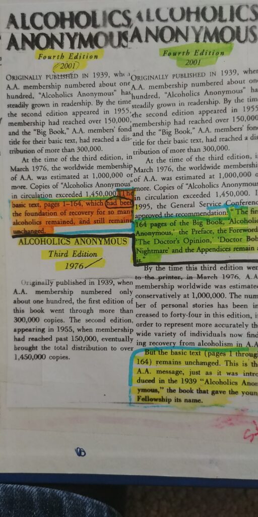 A page of an old book with colored text and notes.